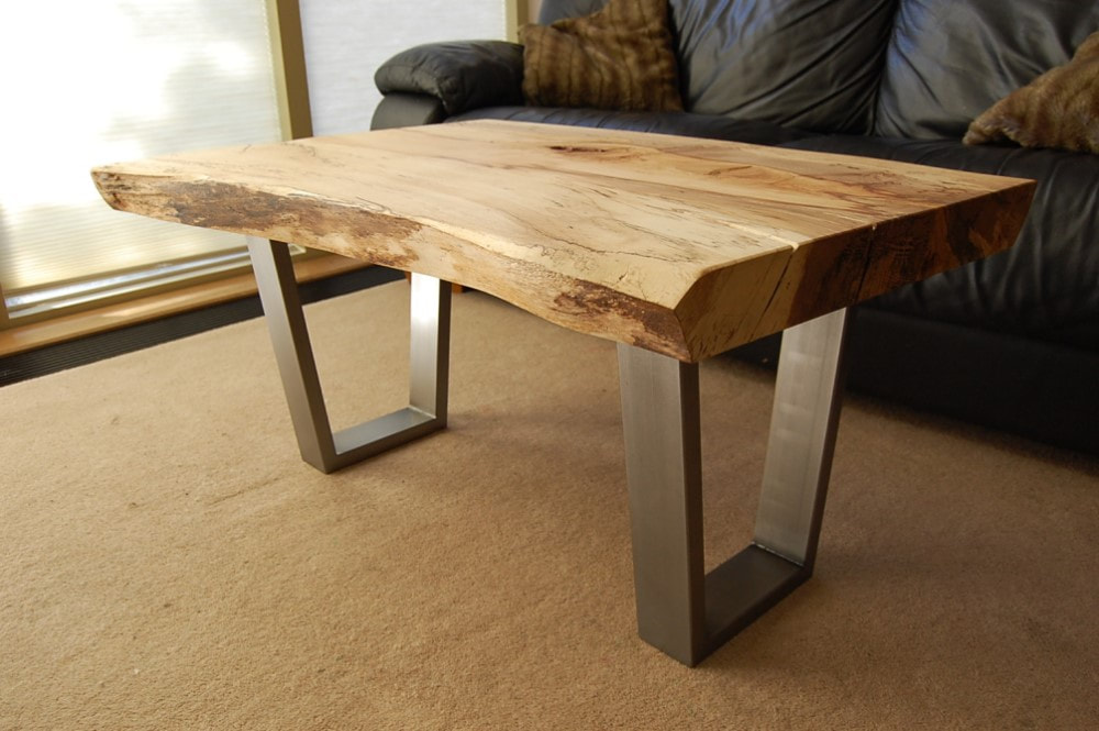 Spalted beech live-edge wood slab sitting on industrial steel v-shape legs
