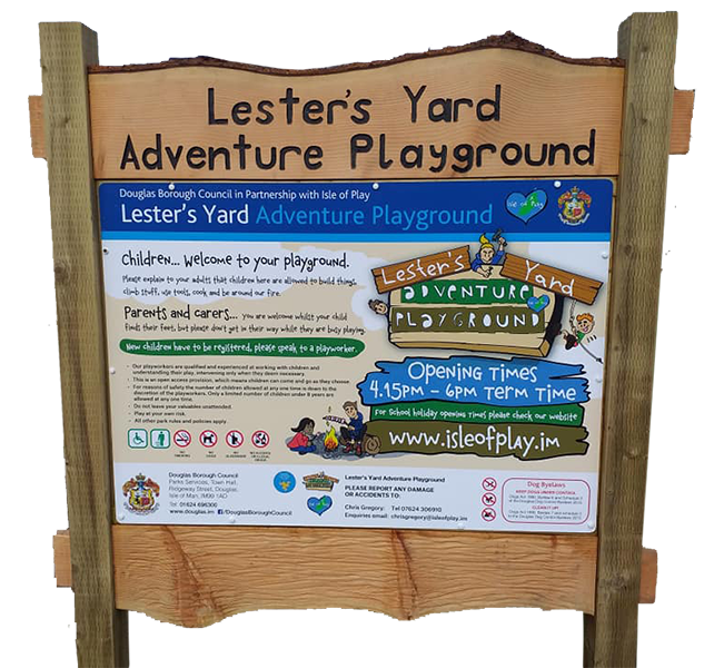 Adventure playground sign using wood slabs