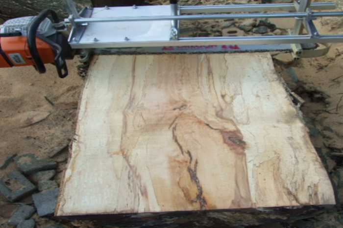 Chainsaw milling live edge wood slabs
