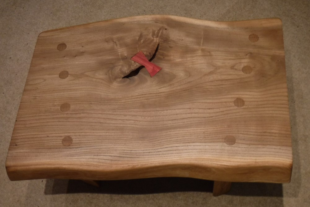 Elm coffee table with bowtie joint
