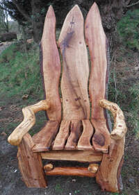 Enchanted woodland storytelling chair made with waney edge wood